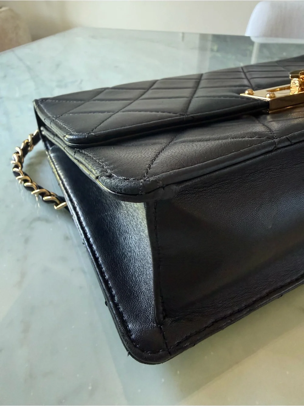 CHANEL Black Quilted Shoulder Bag with Gold Hardware